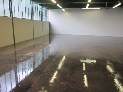 Prepared floor surface primed with epoxy primer Prepared floor surface primed with epoxy primer