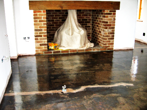 Prepared and primed concrete substrate at Durham home Prepared and primed concrete substrate at Durham home