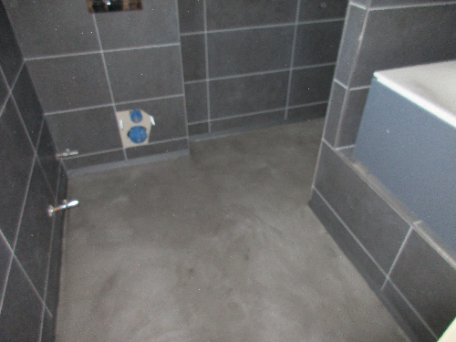 Micro screed floor installed within walk in shower  