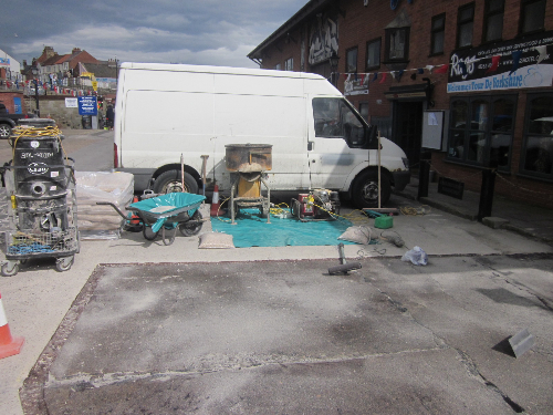 Concrete substrate primed with fast cure epoxy coating Concrete substrate primed with fast cure epoxy coating