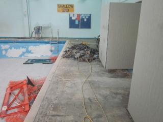 Removal of defective rubber flooring surface 